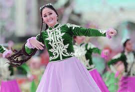 a girl is dancing on nowruz day International Day of Nowruz history